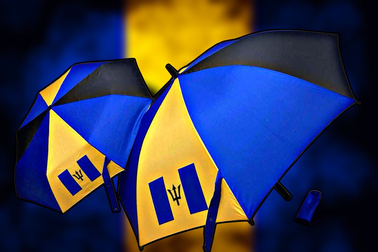 Colorful Barbados flag umbrella featuring blue and yellow colors with the national emblem for stylish sun protection