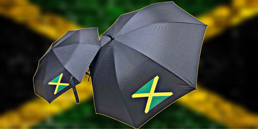 Large black umbrella Jamaica featuring vibrant yellow and green Jamaican flag design, perfect for style and protection